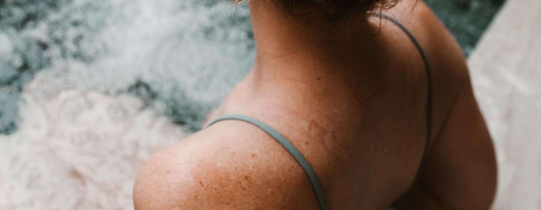 woman sitting in hot tub